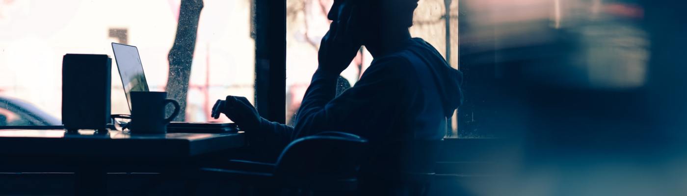 Image of silhouette of a person working by Hannah Wei, Unsplash